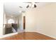 Hallway with wooden railing, carpet, and natural light at 559 Northbridge Dr, Altamonte Springs, FL 32714