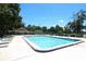 Community pool with many lounge chairs and a community building at 559 Northbridge Dr, Altamonte Springs, FL 32714