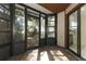 Sunroom featuring glass panels and tile flooring at 559 Northbridge Dr, Altamonte Springs, FL 32714