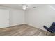 Well-lit bedroom with hard surface floors and a modern ceiling fan at 633 London Rd, Winter Park, FL 32792