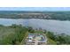 Expansive aerial view of the community, highlighting its waterfront location and serene surroundings at 647 Ella Mae Dr, Davenport, FL 33897