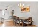 Dining room featuring a large table with seating for six and stylish décor at 647 Ella Mae Dr, Davenport, FL 33897
