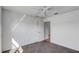 Standard bedroom featuring carpeting, a ceiling fan and closet at 7233 Se 171St Pond Ln, The Villages, FL 32162