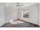 Well-lit bedroom featuring a ceiling fan and a window at 7233 Se 171St Ln, The Villages, FL 32162