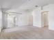 Large main bedroom with mirrored closet doors and doorway at 7233 Se 171St Pond Ln, The Villages, FL 32162