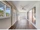 Bright sun room featuring lots of natural light and windows at 7233 Se 171St Pond Ln, The Villages, FL 32162