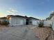 Charming single-story home featuring a concrete driveway and well-maintained landscaping at 8387 Se 174Th Clifton Pl, The Villages, FL 32162