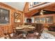 This living room features wooden walls, tile floors and vaulted ceilings at 10301 Us Highway 27 # 114, Clermont, FL 34711