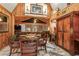 This living room features wooden walls, tile floors and vaulted ceilings at 10301 Us Highway 27 # 114, Clermont, FL 34711