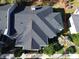 An aerial view of the house showcasing the unique roof and surrounding greenery at 1055 Kensington Park Dr # 503, Altamonte Springs, FL 32714