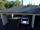 View of the carport, including the parking spaces for residents and their vehicles at 1055 Kensington Park Dr # 503, Altamonte Springs, FL 32714