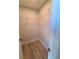 Walk-in closet featuring wood-look floors and shelving at 12913 Sw 82Nd Avenue Rd, Ocala, FL 34473