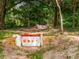 Outdoor obstacle course featuring rustic wooden jumps in a wooded setting, perfect for equestrian training at 13045 Mountain Trail, Clermont, FL 34715