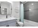 Cozy bathroom featuring vanity, toilet, and tub/shower combination at 1324 Utah Blvd, Orlando, FL 32803