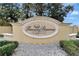 Elegant community sign for Tuscany Preserve surrounded by landscaping and greenery at 1411 Pacific Rd, Poinciana, FL 34759