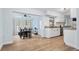 Dining area featuring a modern ceiling fan, and a large table with seating for six situated near the kitchen at 1412 Lakecrest Dr, Apopka, FL 32703