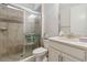 Clean bathroom with a glass-enclosed shower, modern sink, and tasteful decor at 14504 Sunbridge Cir, Winter Garden, FL 34787