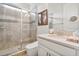 Bathroom vanity with glass-enclosed walk-in shower at 14504 Sunbridge Cir, Winter Garden, FL 34787