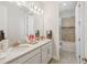 Bathroom featuring double sinks and a shower/bath combo at 14504 Sunbridge Cir, Winter Garden, FL 34787