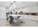 Spacious kitchen featuring an oversized island, pendant lighting, and modern stainless steel appliances at 14504 Sunbridge Cir, Winter Garden, FL 34787