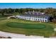 Exterior of the grand clubhouse overlooking the meticulously maintained golf course at 1554 Eagle Nest Cir, Winter Springs, FL 32708