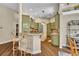 Inviting kitchen area featuring an open layout, granite countertops, and island at 1554 Eagle Nest Cir, Winter Springs, FL 32708