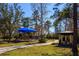 Well-maintained park with playground and walking paths amidst mature trees at 1554 Eagle Nest Cir, Winter Springs, FL 32708