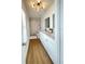 Bathroom featuring a double vanity with granite countertops and a walk-in shower at 1714 Sherbourne St, Winter Garden, FL 34787