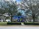 Playground in community featuring play structure, landscaping, and benches at 1714 Sherbourne St, Winter Garden, FL 34787