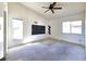 Bedroom with vaulted ceilings, neutral carpet, natural light, and a ceiling fan at 2452 Atrium Cir, Orlando, FL 32808