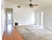 Bright living room with hardwood floors and natural light from sliding glass door at 2452 Atrium Cir, Orlando, FL 32808