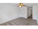 A carpeted bedroom features a ceiling fan and a double-door closet at 2913 Ashford Park Pl, Oviedo, FL 32765