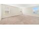 Spacious bedroom with plush carpet, neutral walls and natural light at 3070 Prelude Ln, Kissimmee, FL 34746