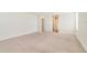 Large bedroom featuring neutral carpet, ample space, and closet at 3070 Prelude Ln, Kissimmee, FL 34746