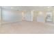 Open loft area with neutral carpeting and lots of natural light at 3070 Prelude Ln, Kissimmee, FL 34746