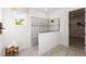 Modern bathroom featuring a glass shower, large window, and tile flooring at 3235 Legends Preserve Dr, Daytona Beach, FL 32124