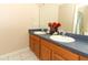 Bathroom featuring double sinks, vanity, and decor, providing a functional and stylish space at 324 Lusitano Way, Sanford, FL 32773