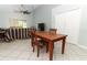 A cozy living room featuring a ceiling fan, tile flooring and neutral walls at 324 Lusitano Way, Sanford, FL 32773