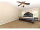 A spacious main bedroom featuring plush carpeting, a ceiling fan, and dual windows for great natural light at 324 Lusitano Way, Sanford, FL 32773