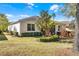 Well-maintained backyard with lush landscaping and healthy lawn at 3618 Solana Cir, Clermont, FL 34711