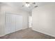 Bedroom featuring a ceiling fan and large closet at 3618 Solana Cir, Clermont, FL 34711