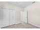 Neutral bedroom with a closet and a doorway to another room at 3618 Solana Cir, Clermont, FL 34711