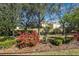 Mature landscaping with colorful foliage at 3618 Solana Cir, Clermont, FL 34711