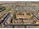 A scenic aerial view of a residential community featuring well-maintained landscaping and numerous homes at 3653 Calabria Ave, Davenport, FL 33897