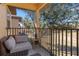 Cozy balcony with outdoor seating, offering a relaxing space to enjoy the view at 3653 Calabria Ave, Davenport, FL 33897