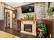 Unique bedroom features a stone fireplace and TV, creating a cozy and distinctive space at 3653 Calabria Ave, Davenport, FL 33897