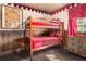 Cozy bedroom features bunk beds, and Harry Potter themed decor at 3653 Calabria Ave, Davenport, FL 33897