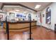 Well-lit lobby featuring a reception desk, comfortable seating, and a welcoming atmosphere for residents and visitors at 3653 Calabria Ave, Davenport, FL 33897