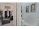 Walk-in closet with custom organization and a view to the powder room at 3704 Via Monte Napoleone Dr, Poinciana, FL 34759