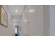 Bright hallway with white doors and trim, showcasing the home's clean design at 3704 Via Monte Napoleone Dr, Poinciana, FL 34759